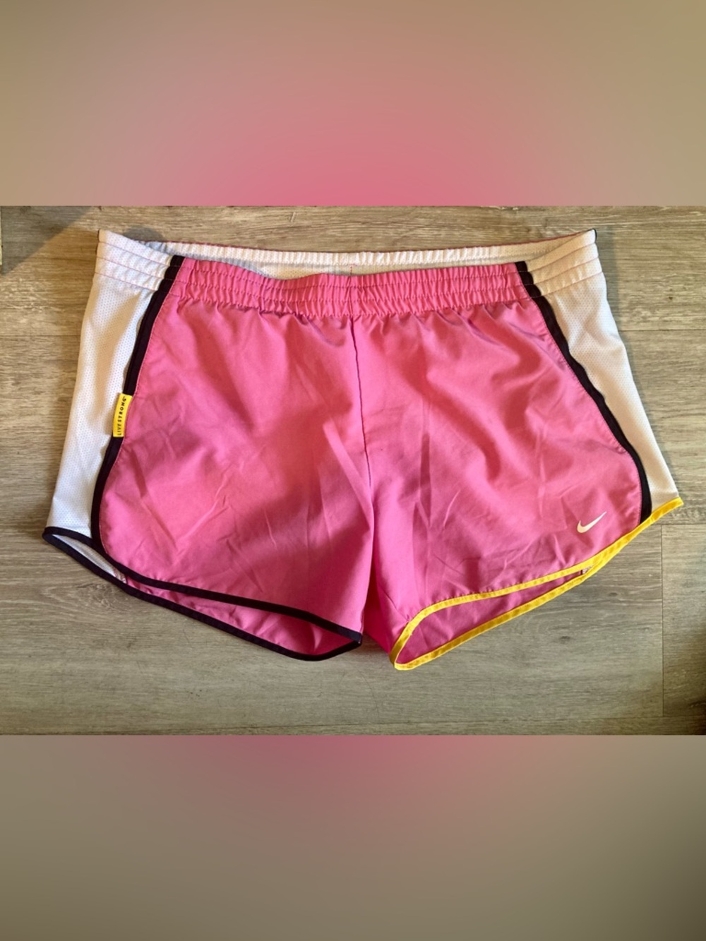 Nike Pink Running Shorts with Black and Yellow Trim